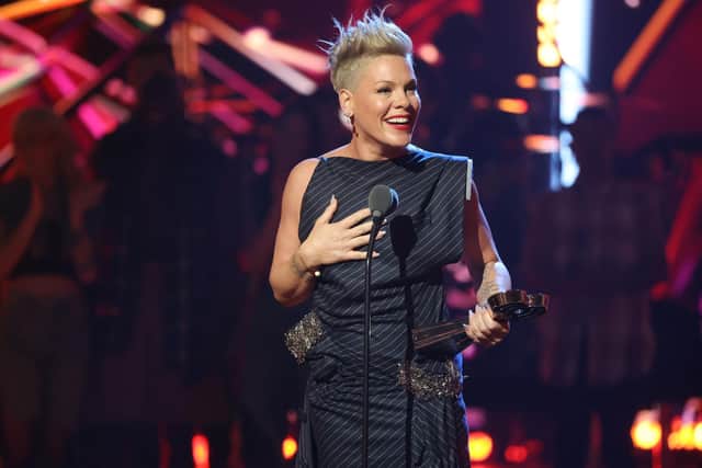 HOLLYWOOD, CALIFORNIA - MARCH 27: Honoree P!NK accepts the iHeartRadio Icon Award onstage during the 2023 iHeartRadio Music Awards at Dolby Theatre on March 27, 2023 in Hollywood, California. (Photo by Monica Schipper/Getty Images)