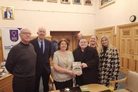 Mayor pictured with Tony Hassan and guests during a recent visit to the Guildhall to present a copy of his book.