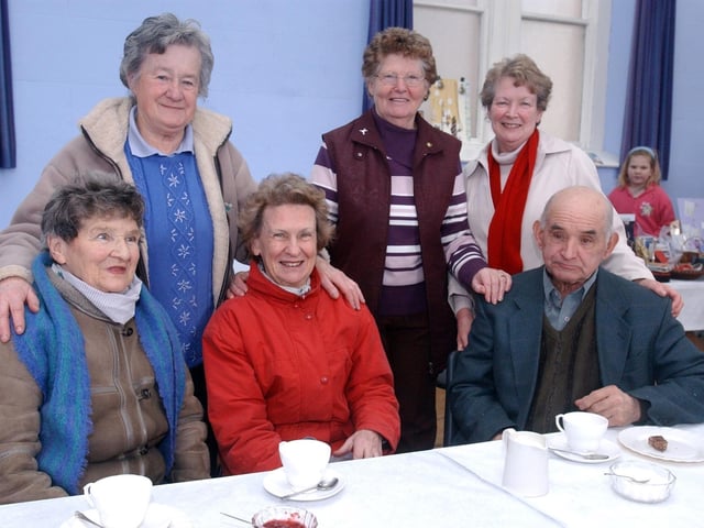 Enjoying a cup of tea at the Inishowen Methodist Craft and Cake Sale are, seated from left, Carrie McLaughlin, Celine Doherty, and Ernest Norris. Standing, from left, Jean Cunningham, Martha Hutchinson, and Ethal McMonagle. (2911PG02)                                : Christmas in Inishowen in 2005.