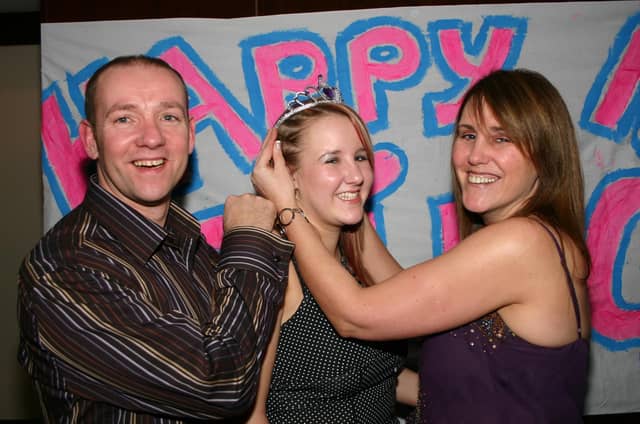 Birthday Girl Tina gets a hand from Mum Fionnuala and dad Daniel at her 18th in the Tower Hotel. 2511/dd : Parties and nights out in Derry and Donegal in February 2006.