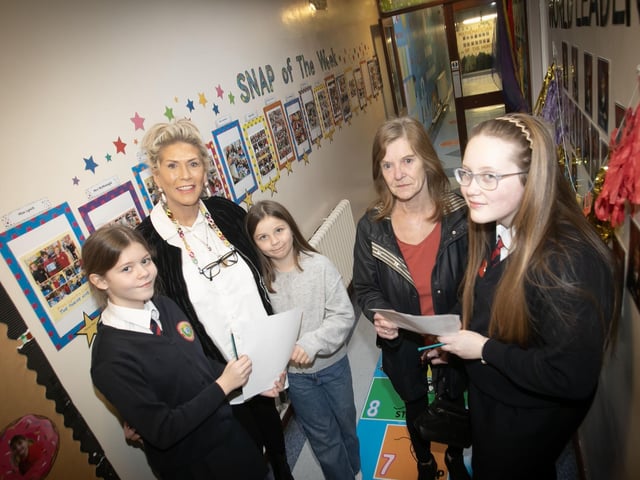 Grannies Elaine MAxwell and Bernadette Canning pictured with their granddaughters at Holy Child PS. : .