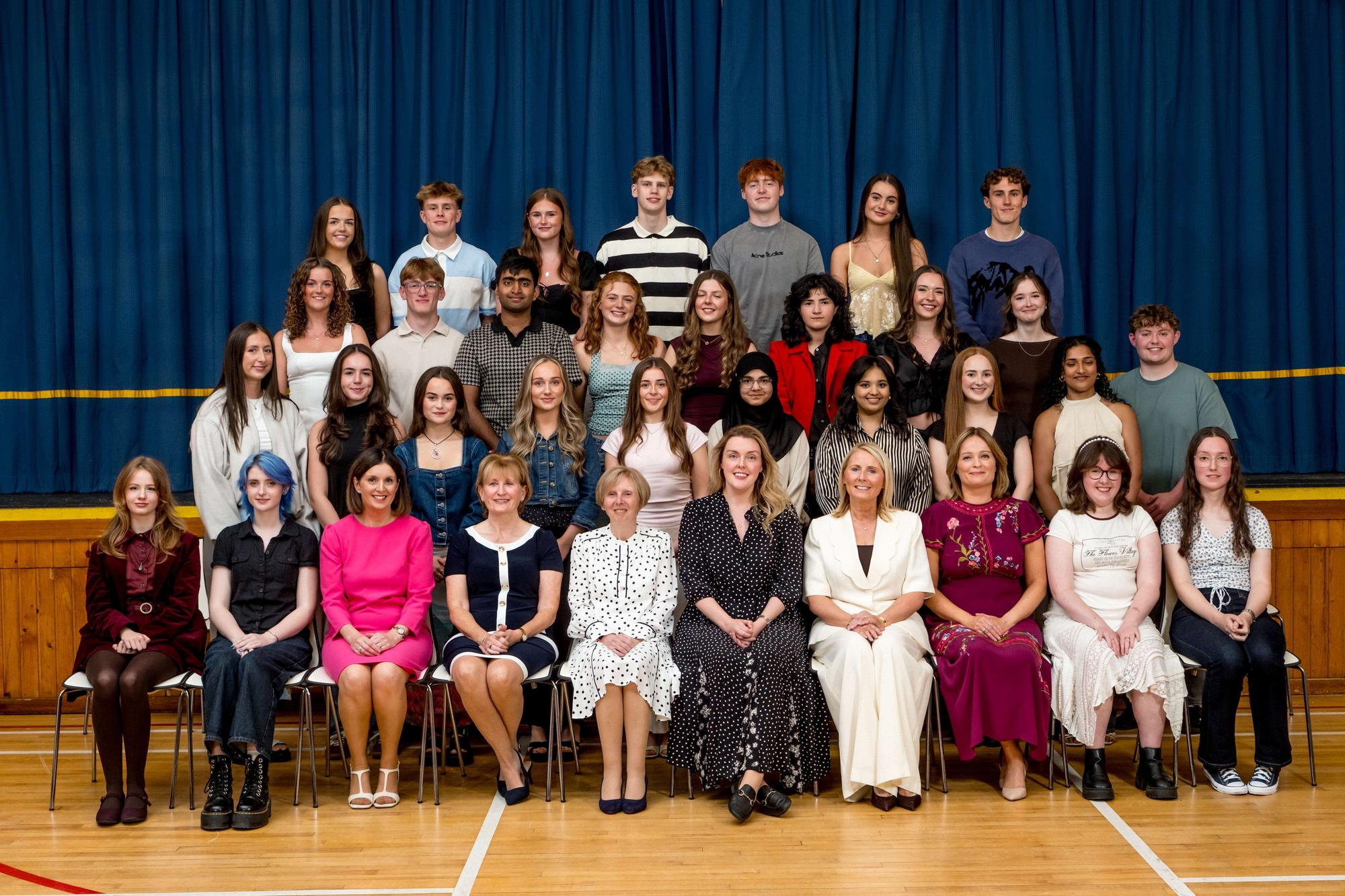 Excellence in A2 Results: Some of the pupils who achieved 3 A grades or more in their A2 Examinations with Ms Niamh Hargan (Guest Speaker), Mrs Jacinta Bradley (Vice Chairperson, Board of Governors), Dr Marie Ferris (Principal), Mrs Brónach O’Hare (Vice Principal),Ms Catherine Hughes(Senior Teacher)& Ms Maeve Mc Menamin (Senior Teacher). Lumen Christi College.