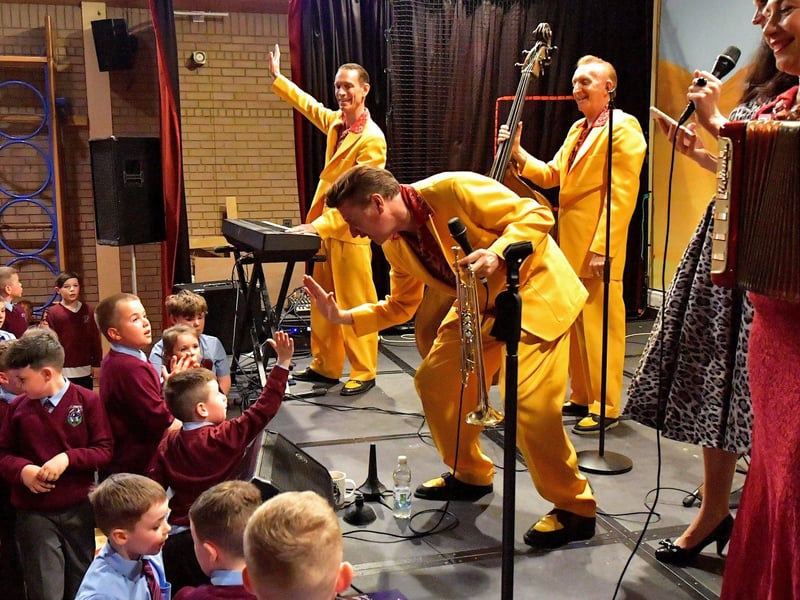 Mayor of Derry & Strabane Patricia Logue presents the fun and outgoing festival favourites, the Jive Aces at the Guildhall in aid of the Mayor's charities, the Foyle Hospice and the Ryan McBride Foundation. This is definitely a fun event that all the family can enjoy together. Pictured are the Jive Aces opening the 2023 Jazz Festival with a performance in St St John’s Primary School. Photo: George Sweeney. DER2317GS – 25