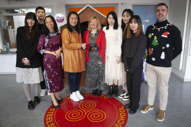 Mrs Siobhan Gillen, Principal, Steelstown PS pictured welcoming the Confucius Chinese group to the school last week, where they took part in a number of activities with the pupils. (Photos: Jim McCafferty Photography)