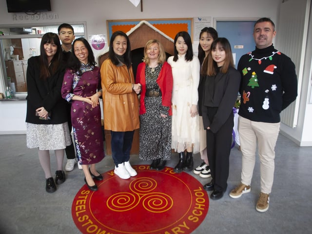 Mrs Siobhan Gillen, Principal, Steelstown PS pictured welcoming the Confucius Chinese group to the school last week, where they took part in a number of activities with the pupils. (Photos: Jim McCafferty Photography)