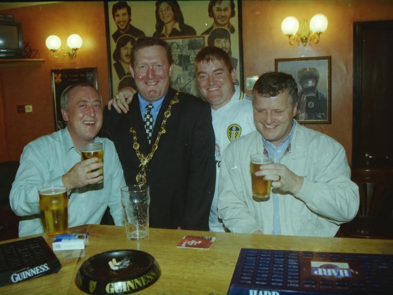 The Mayor of Derry, Councillor Pat Ramsey, enjoying a pint with some Leeds United supporters.
