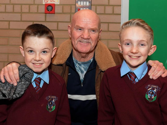 Damien McDermott with Kyron and Lennon at St John’s PS Grandparents Vintage Tea. Photo: George Sweeney