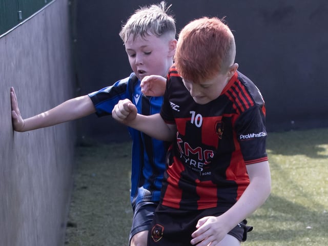 Action from the recent semi-final clash between Phoenix Athletic and Oxford United at Bay Road in the Padraig Barton Memorial Cup. (Photos: Jim McCafferty Photography)