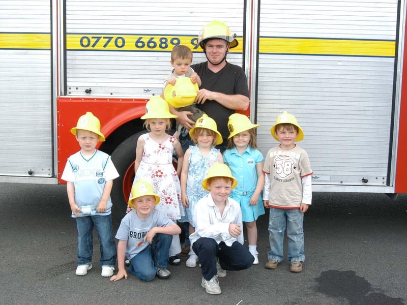 Everyone gathered with Rebekah McGettigan to take a photo on her birthday.