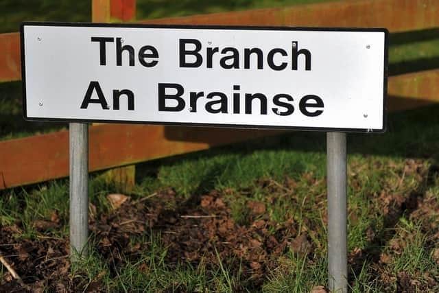 Bilingual street sign at The Branch. DER2104GS-047
