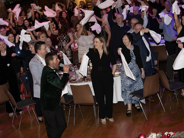 Host Micky Doherty gets everyone into the spirit during Friday night's Charity Christmas Ball in the Guildhall, Derry. : Mayor's Charity Ball.