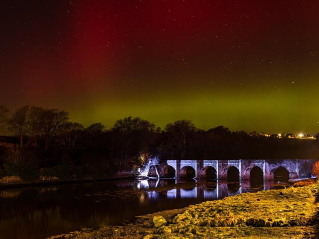 The Aurora Borealis pictured over the iconic Castle Bridge in Buncrana. Picture: Sinead Craig.