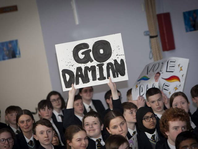 One of the many banners in support of Damian at Lumen Christi College on Tuesday.
