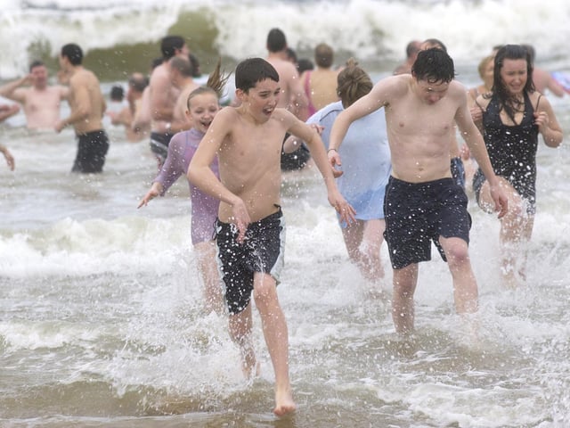 Fun and games on Culdaff beach. (0301PG11) : Culdaff New Year's Day Swim in 2006.