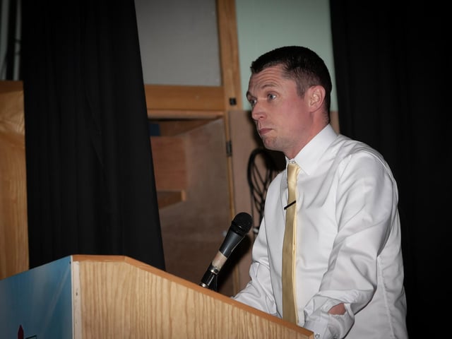 Mr. Emmett McGinty, teacher, St. Joseph's Boys School, addressing the attendance at Open Night on Thursday last.