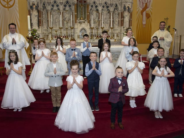 Pupils from Oakgrove Integrated Primary School pictured after receiving the Sacrament of First Holy Communion from Fr. Patrick Lagan at St. Columba’s Church, Waterside on Friday afternoon last. Inlcuded is Deacon Stephen Ward. (Photos: Jim McCafferty Photography)