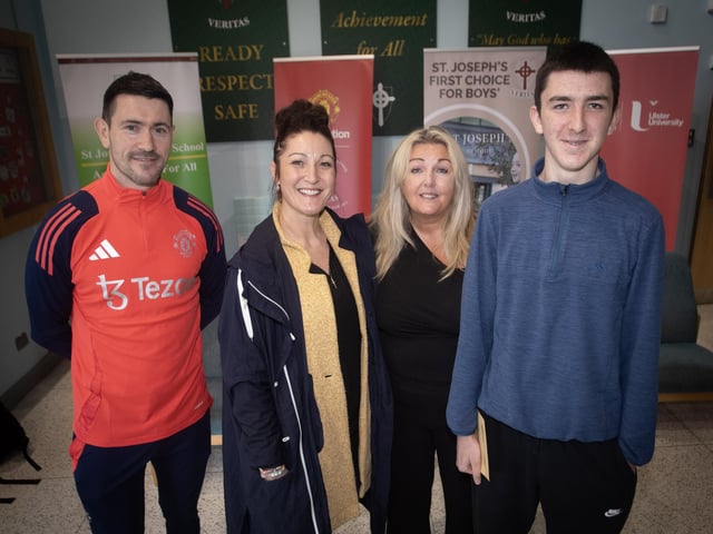 Mrs. Ciara Deane, Principal, St. Joseph's Boys School congratulating Caolan Harkin on his GCSE success on Thursday morning. Included from left are Declan Lynch, Manchester United Foundation and Caolan's mum Julie. (Photos: Jim McCafferty Photography)