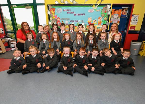 Mrs Parke’s P1 class at Holy Family Primary School. Included in the photograph are classroom assistants Miss Kayleigh and Miss Deirde.