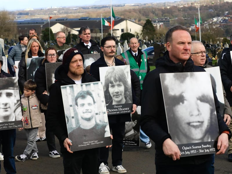 Family members carrying portraits of their loved ones at the Easter Commemoration, as they make their way to the Republican plot in the City Cemetery. (Photo - Tom Heaney, nwpresspics)