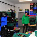 Paul Duffy works in the Foyle Foodbank distribution centre in Springtown Industrial Estate.  Photo: George Sweeney. DER2250GS – 26