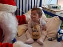 Santa and Poppy Kosky Thompson