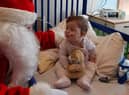 Santa and Poppy Kosky Thompson
