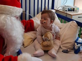 Santa and Poppy Kosky Thompson
