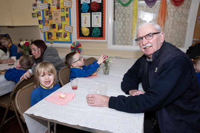 Grandad Kevin Clifford having some fun with his grandchildren during Holy Child's 'Grandparents To School' Day.