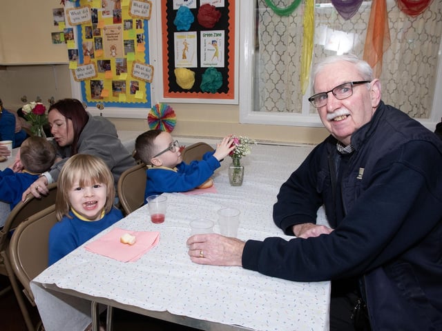 Grandad Kevin Clifford having some fun with his grandchildren during Holy Child's 'Grandparents To School' Day.