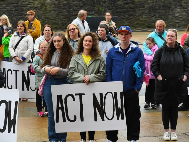 Some of the attendance, in Guildhall Square, at Caleb's Cause rally calling for legal protection for young people with Special Educational Needs who have disabilities in Northern Ireland beyond the age of 19. Photo: George Sweeney