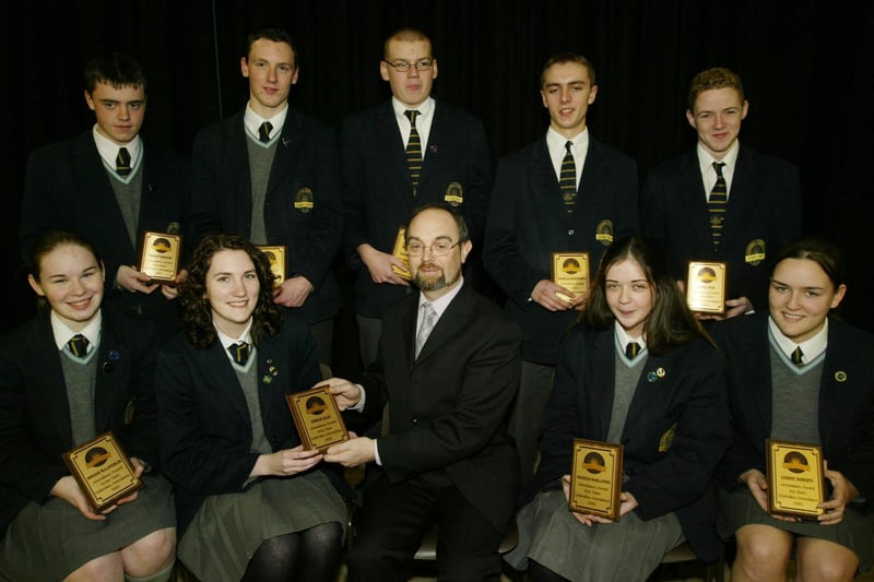 Recipients of unbroken attendance awards pictured with Mr Pat O'Doherty at the Lumen Christi College Senior prizegiving. Seated are Oonagh McLaughlin, Eimear Blee, Mr O'Doherty, Mairead McGilloway and Lyanne Doherty. Standing are Emmet Dorrian, Dermot McDaid, Edward Casey, Nicholas McMenamin and Daniel Page. (1001JB27)