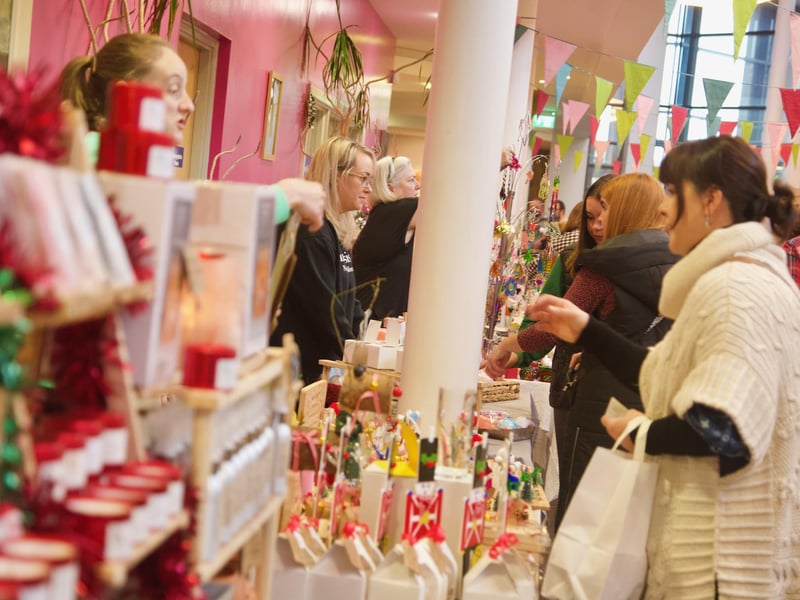 People enjoying the St. Mary's College Christmas Fair.