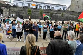 Some of the attendance at a vigil held in Guildhall Square to highlight the murder of Al Jazeera journalists in Gaza by Israel Defence Forces. Photo: George Sweeney / Derry Journal