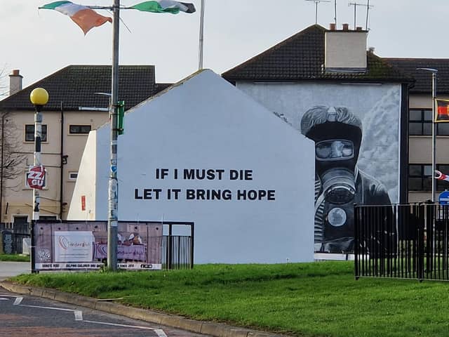 The quote from a Palestinian poet and academic, Rafaat Alareer who was killed in an Israeli airstrike last month, has been painted on Free Derry Corner.