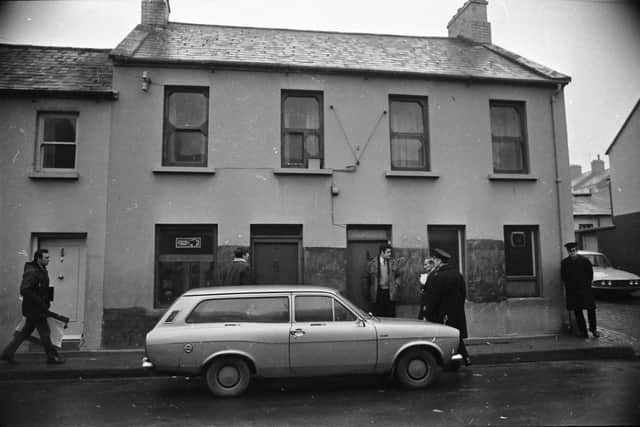 Members of the RUC outside Annie's Bar after the mass murder.