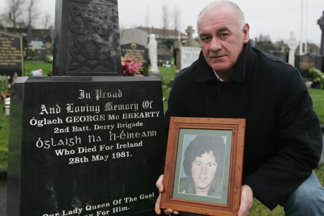 Danny McBreary, at his brother George's graveside in 2007.