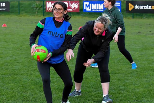 Action from Doire Trasna’s first Mothers and Others football practice session, at Corrody Road. Photo: George Sweeney. DER2316GS – 22