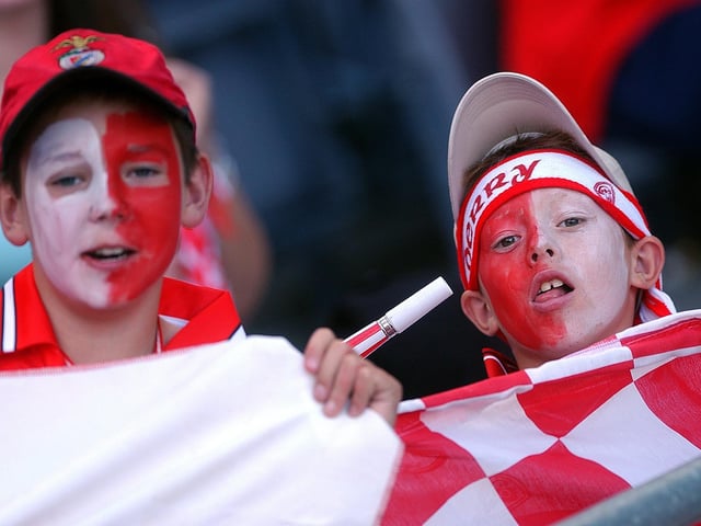 The younger fans made a special effort to wear their county's colours. (3108A30)