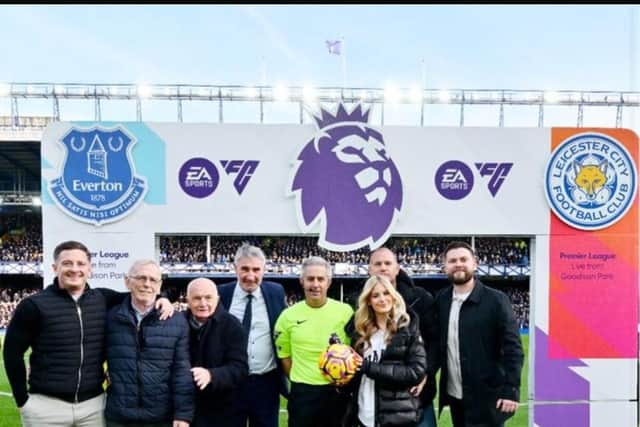 Central 67 Mortgages Ltd, sponsors of match ball for Premier League fixture between Everton and Leicester City, presenting the match ball to the referee on the Goodison Park pitch