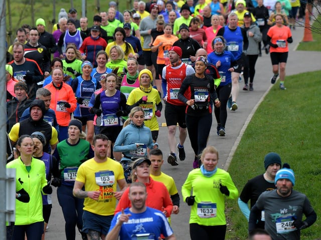 Runners make their way through St Columb’s Park during the Bentley Group Derry 10 Miler road race on Saturday morning. Photo: George Sweeney. DER2310GS – 102