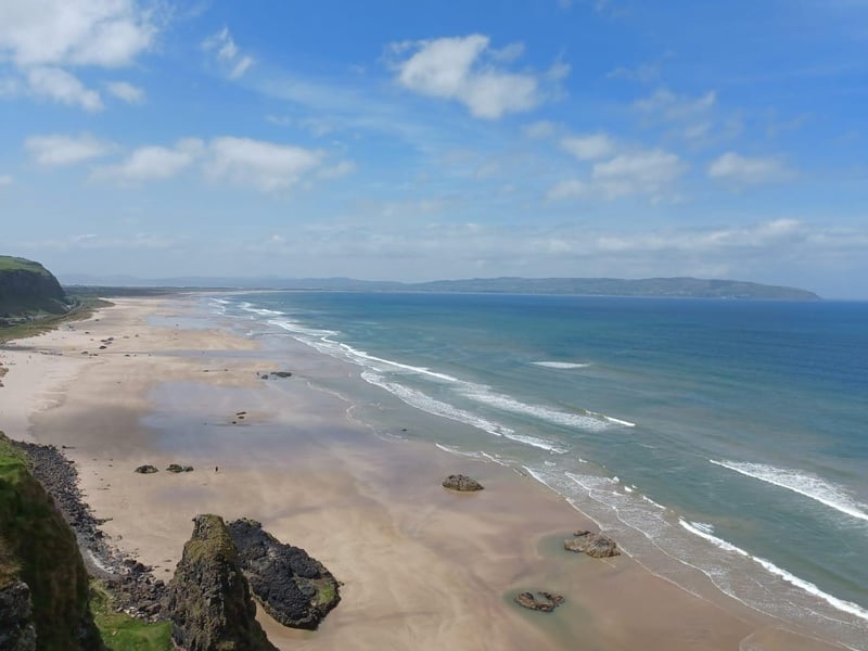 Magnificent Benone Strand stretches seven miles from Magilligan Point to Downhill. If the tide is out far enough it is possible to walk from the point the whole way to Castlerock - another fine bathing spot. The spectacular golden strand is on the Atlantic and thus can be prone to rip currents so extra care should be taken. There are lifeguards at Benone and Castlerock so swim between the flags.