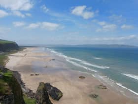 Magnificent Benone Strand stretches seven miles from Magilligan Point to Downhill. If the tide is out far enough it is possible to walk from the point the whole way to Castlerock - another fine bathing spot. The spectacular golden strand is on the Atlantic and thus can be prone to rip currents so extra care should be taken. There are lifeguards at Benone and Castlerock so swim between the flags.