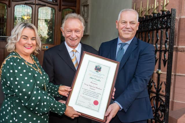 Phil Coulter who has received the Freedom of Derry pictured with Derry City and Strabane District Council Mayor, Councillor Sandra Duffy and Chief Executive, John Kelpie. Picture Martin McKeown. 07.10.22 