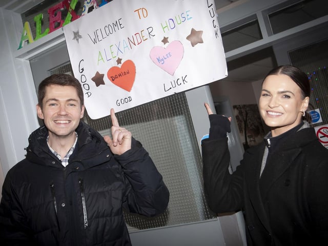 SUPPORT NOTED!. . . .Damian and his dance partner Kylee note the support from all the residents of Alexander House in Derry.