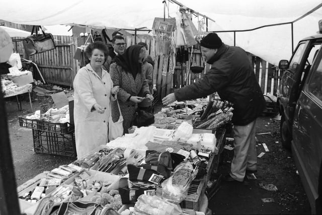 A brisk trade underway at the Foyle Street market.