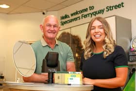 Thomas Healy with Specsavers optometrist Cora McAdams