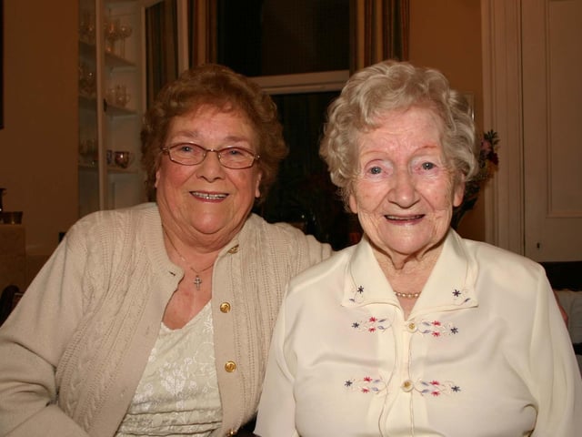 Cousin Tessa Gallagher with the Birthday Girl Mary O'Doherty at the Party. 3898/dd : Parties and celebrations across Derry in May 2006.
