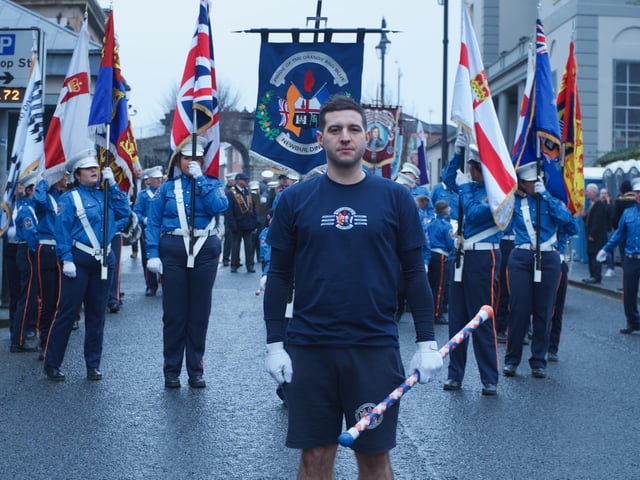 Bandsmen and women participating in the 'Shutting of the Gates' celebrations in Bishop Street.