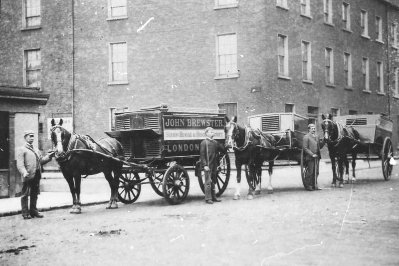Employees of John Brewster & Sons Bakery, Great James Street, circa 1904, post for the photographer alongside their horse-drawn delivery van.