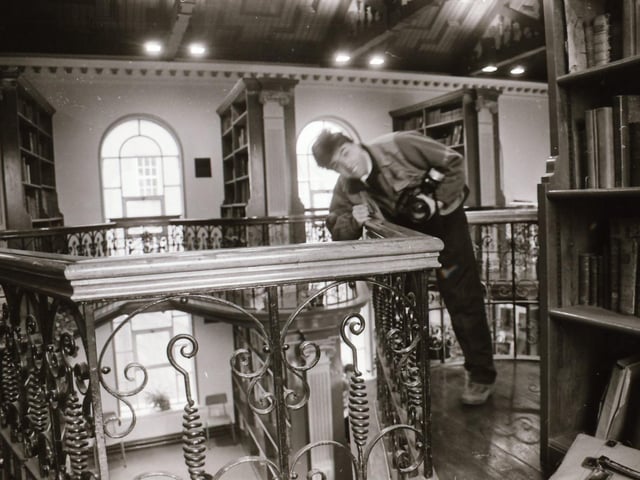 Belfast Telegraph photographer Ian Trevithick at the ornate St Columb's College library off Bishop Street.